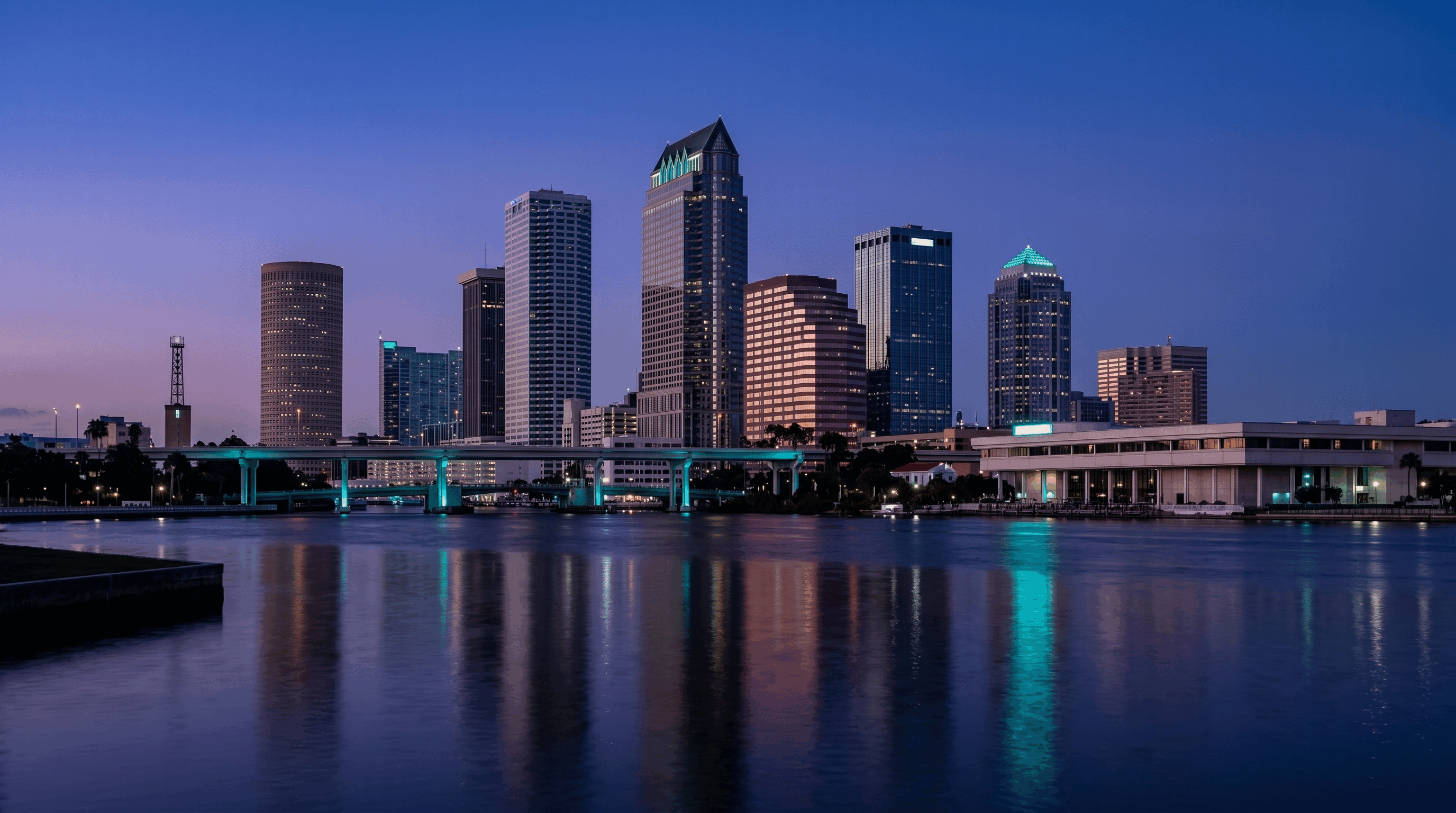 Tampa skyline over water at dusk for Squid X Media Tampa marketing agency services